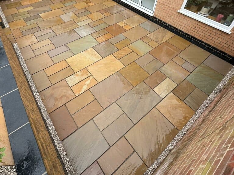 Heritage Paving installed sandstone patio