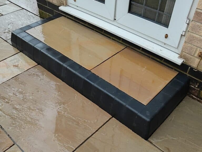 Heritage Paving installed sandstone patio