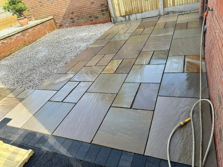 Heritage Paving installed sandstone patio