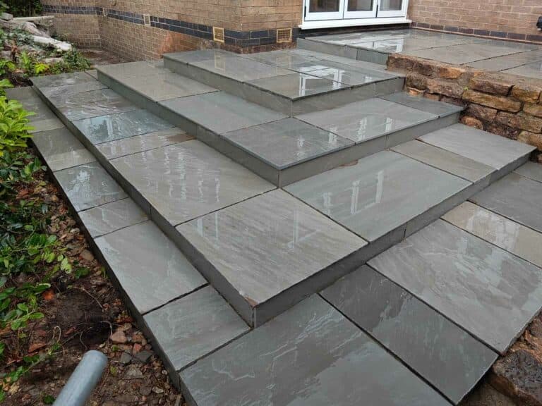 Heritage Paving installed sandstone patio