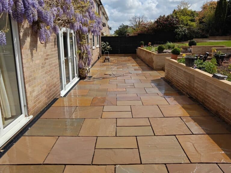 Heritage Paving installed sandstone patio