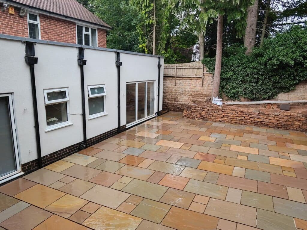 Heritage Paving installed sandstone patio