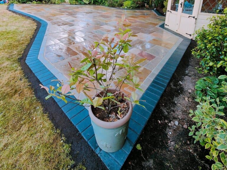 Heritage Paving installed sandstone patio