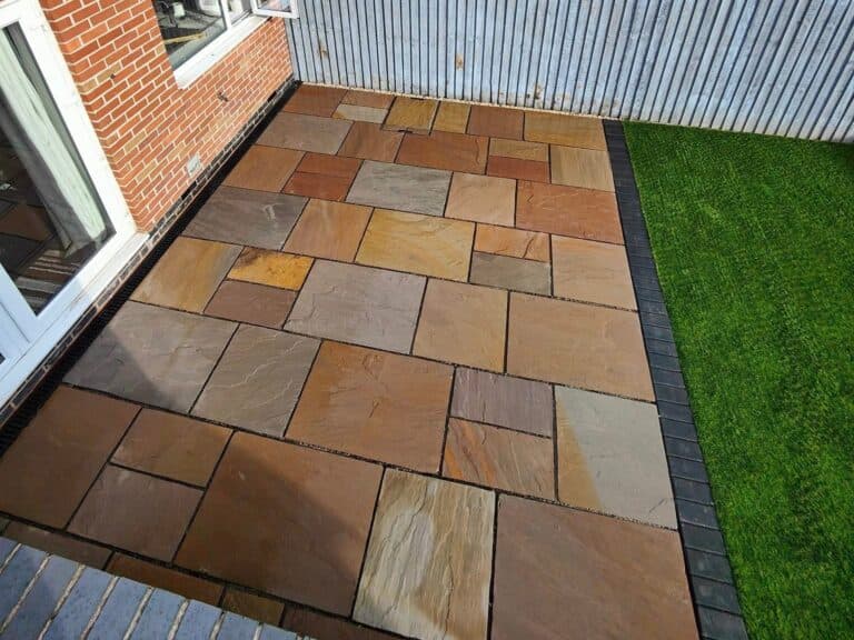 Heritage Paving installed sandstone patio