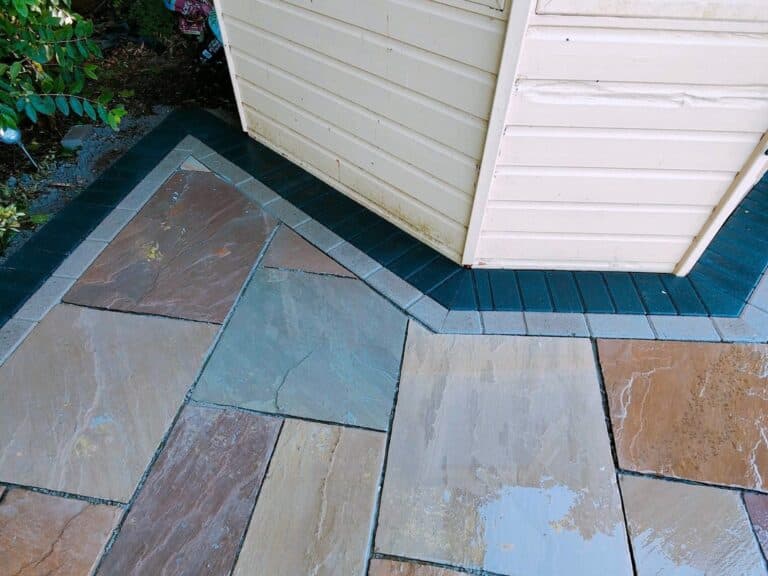 Heritage Paving installed sandstone patio