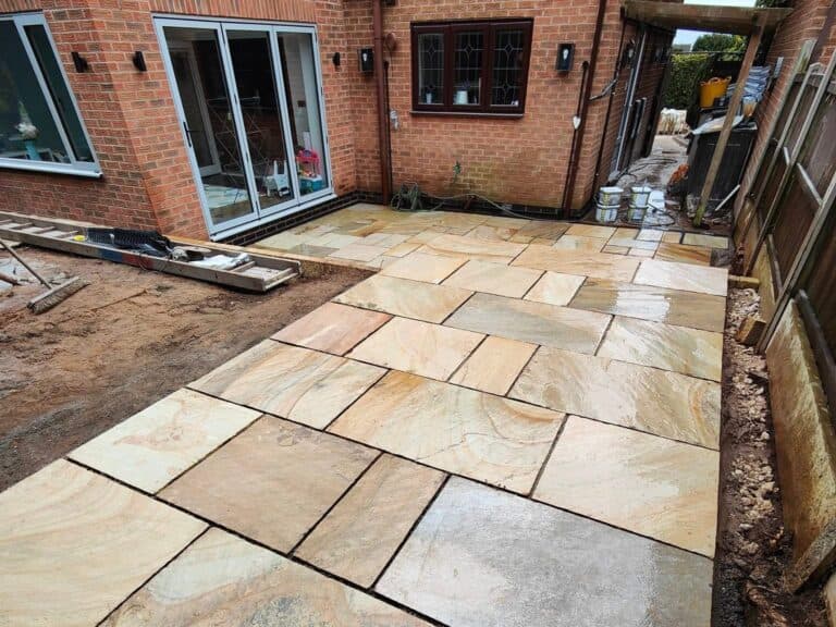 Heritage Paving installed sandstone patio