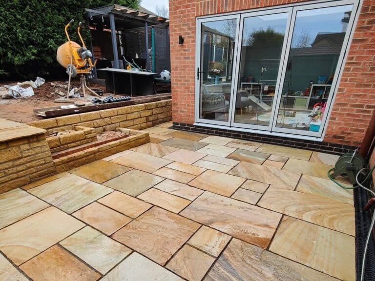Heritage Paving installed sandstone patio