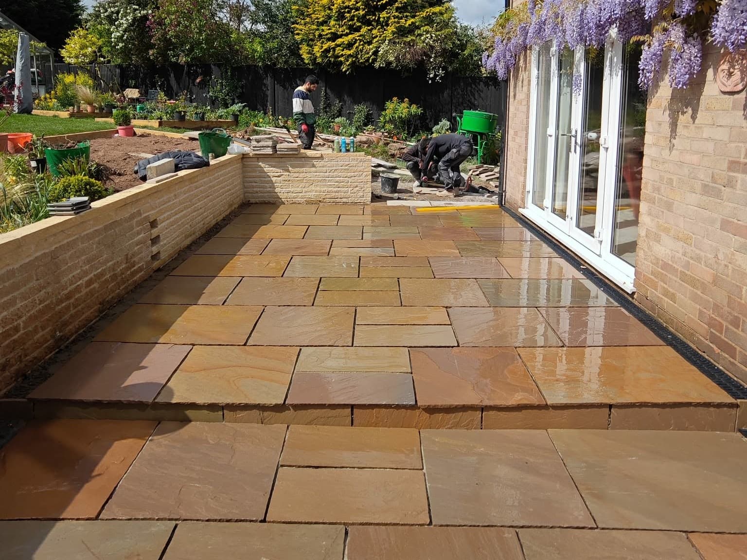 Heritage Paving installed sandstone patio