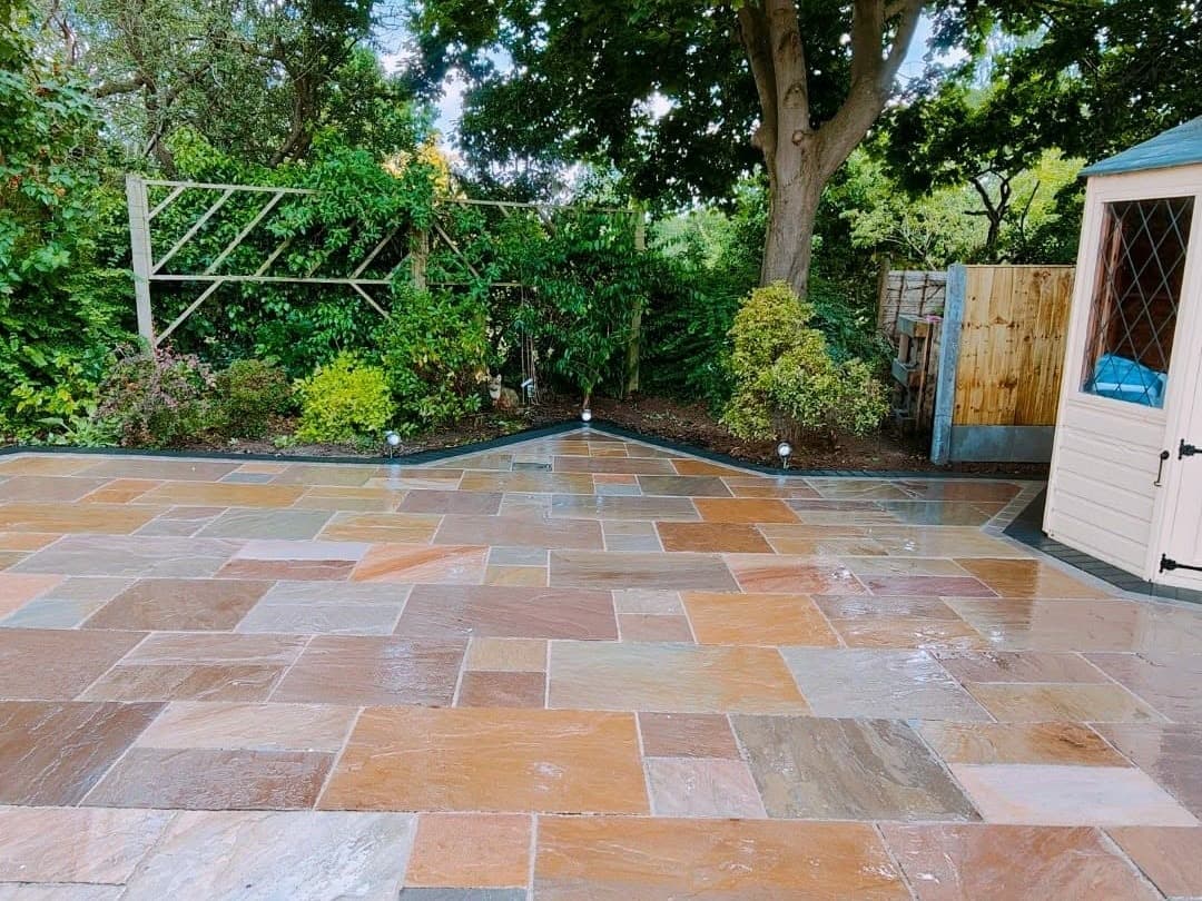 Heritage Paving installed sandstone patio