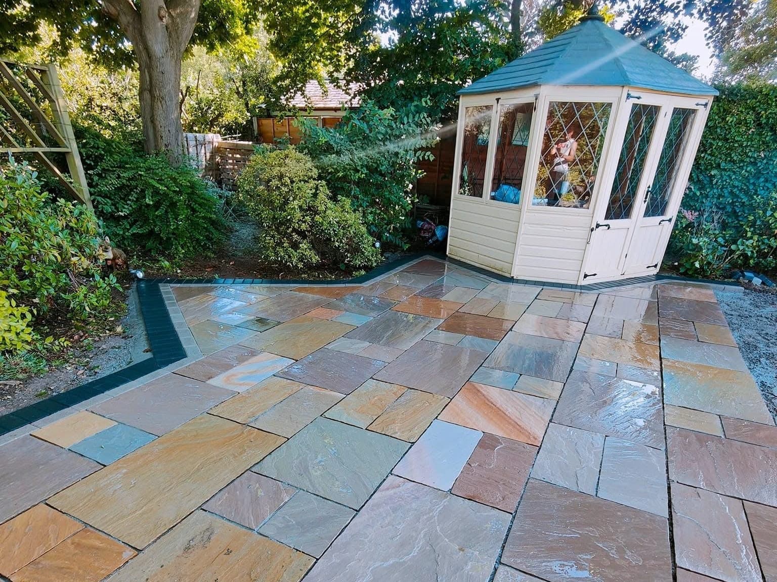 Heritage Paving installed sandstone patio